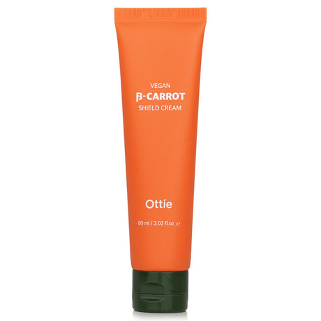 Ottie Vegan Beta Carrot Shield Cream in a 60ml jar, a soothing moisturizer with organic carrot juice and plant-based extracts.