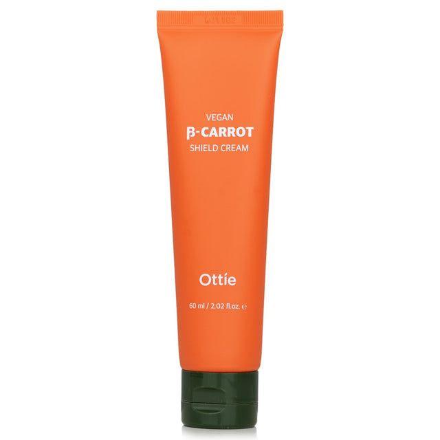 Ottie Vegan Beta Carrot Shield Cream in a 60ml jar, a soothing moisturizer with organic carrot juice and plant-based extracts.