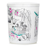 Exotic Garden Candle in white glass, offers a tropical fruity scent blend for a relaxing ambiance, burn time 40 hours.
