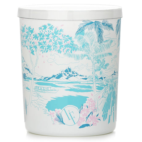 Scented candle in white glass with floral design, offering tropical bergamot, jasmine, and coconut fragrance. 40-hour burn time.