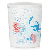 Ocean-inspired Coral Garden scented candle in a stylish white glass, featuring marine accords and musk for tranquility.