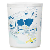 Corsican Garden Scented Candle in white glass, infused with myrtle and immortelle, offers 40 hours of Mediterranean ambiance.