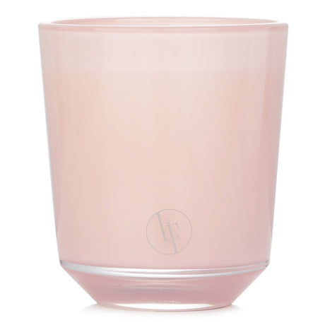 Peony pink scented candle with vibrant rose and elderflower aroma, perfect for creating a cozy, elegant atmosphere.