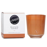 Vanilla Blond scented candle in elegant glass, blending sweet vanilla, orange, and jasmine for a cozy ambiance.