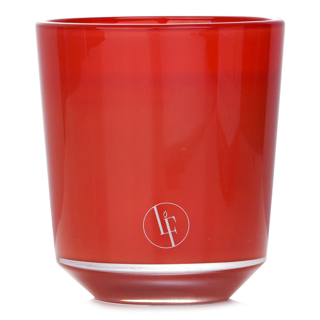 Luxurious Ambre Tan scented candle in coppery brown, featuring heliotrope, amber, and benzoin notes, burns for 40 hours.