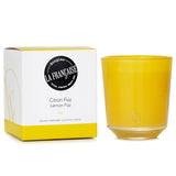 Refreshing Lemon Fizz Candle in vibrant yellow glass, with caviar lemon and mint scent; burns for 40 hours.