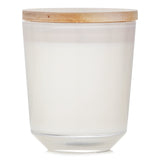 Elegant white glass candle with wooden lid, featuring a floral scent made from eco-friendly vegetable wax, 40-hour burn time.