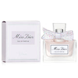 Miniature 5ml bottle of Miss Dior Eau De Parfume, a fruity floral fragrance with notes of mandarin, jasmine, and caramel.