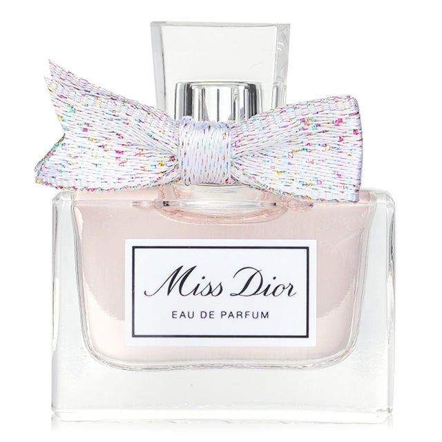 Miniature 5ml Miss Dior Eau De Parfume featuring fruity floral notes, ideal for spirited young women, perfect for on-the-go elegance.