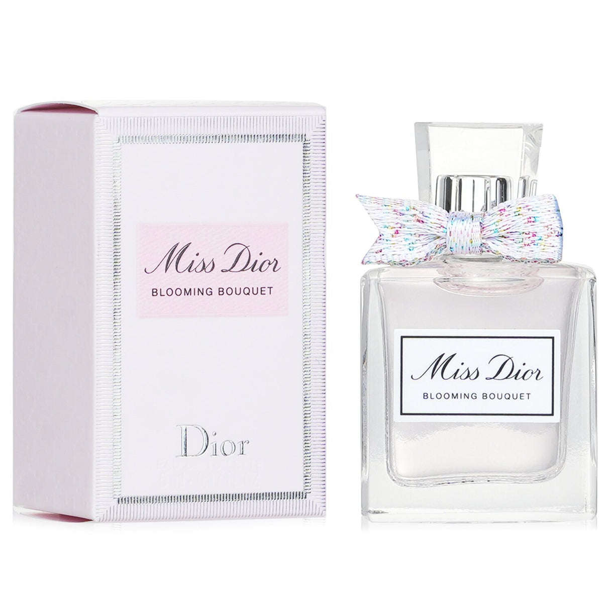 Miniature 5ml bottle of Miss Dior Blooming Bouquet Eau De Toilette featuring floral notes of mandarin, peony, and white musk.