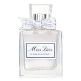 Christian Dior Miss Dior Blooming Bouquet Eau De Toilette in a 5ml miniature, featuring vibrant mandarin, delicate peony, and white musk.