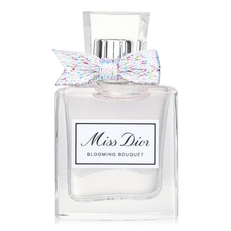 Christian Dior Miss Dior Blooming Bouquet Eau De Toilette in a 5ml miniature, featuring vibrant mandarin, delicate peony, and white musk.