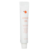 Iyokan Mini Hand Cream in a 20g tube, infused with Iyo citrus for hydration and a refreshing scent, perfect for on-the-go softness.