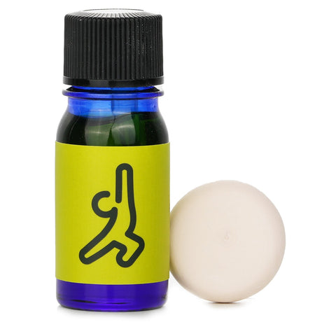 5.5ml essential oil blend featuring grapefruit, frankincense, and orange for yoga and mindfulness practices.