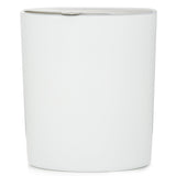 Luxury Sisley Tuberose Candle in matte white glass, offering a soothing fragrance with a 45-hour burn time.