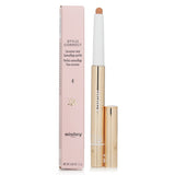 Sisley Stylo Correct #4 concealer pen for flawless skin, featuring high coverage, creamy texture, and double-tip applicator.