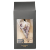 Luxurious Botanica Wood Mist Sachet in Red Berry, featuring calming scents of Mandarin, Peony, and Sandalwood for ambient freshness.