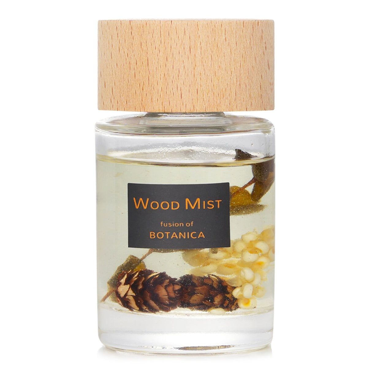 Botanica Eucalyptus Reed Diffuser in transparent bottle with wood lid, showcasing soothing botanicals and elegant design.