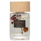 Elegant 60ml Red Berry reed diffuser in a transparent bottle with a wooden lid, featuring a floral and woody fragrance blend.