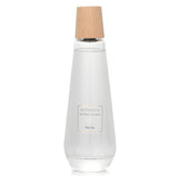 Elegant herbal reed diffuser in a pyramid bottle, infused with soothing scents like peppermint and lavender for serene ambiance.
