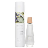 Elegant herbal reed diffuser in pyramid-shaped bottle, infused with calming Peppermint and Lavender scents for serene ambiance.