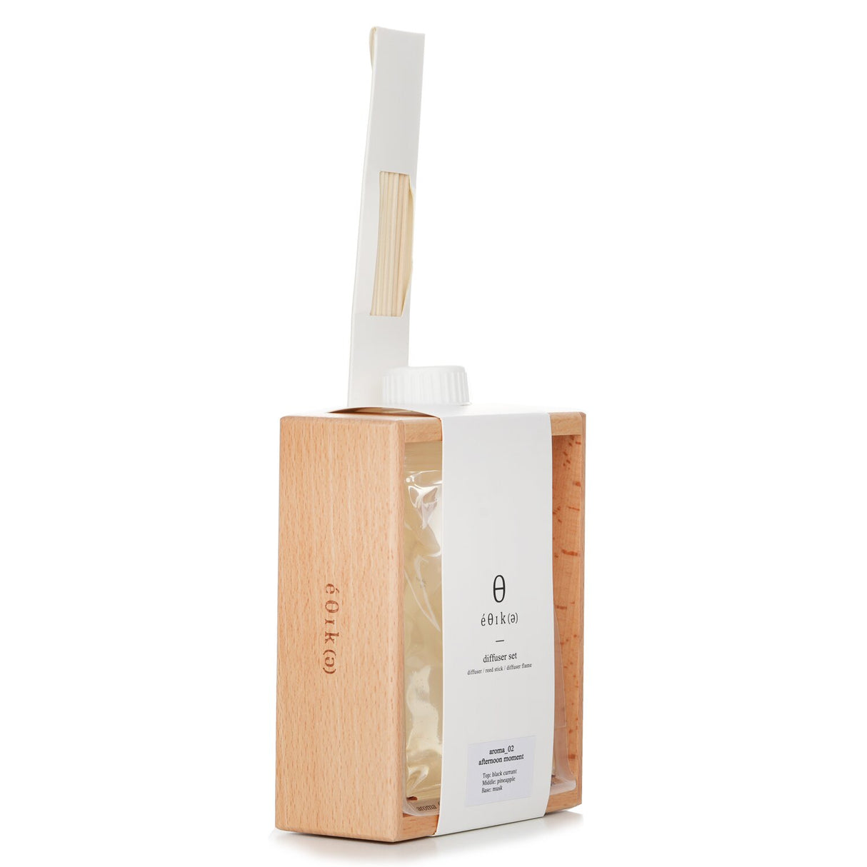 Botanica Esika diffuser set featuring 270ml fragrance oil, wooden stand, and 6 reed sticks for a serene home ambiance.