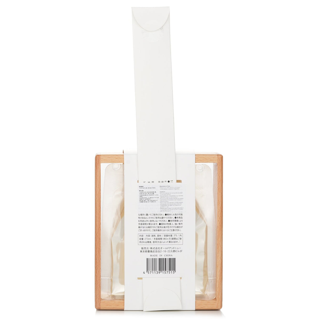 Elegant reed diffuser set featuring bergamot and rose notes, presented in a stylish bottle with a wooden stand and 6 reeds.