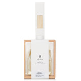 Elegant reed diffuser set with 270ml fragrance oil, wooden stand, and six reed sticks, infusing your home with captivating scents.