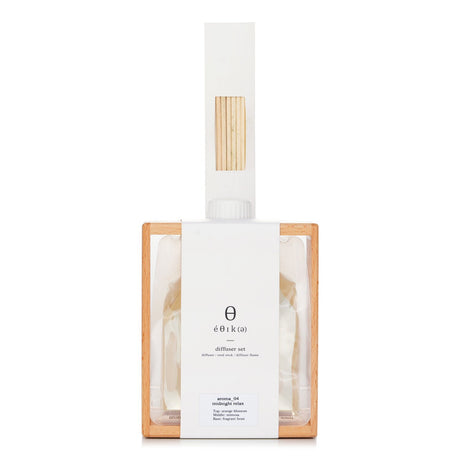 Elegant reed diffuser set with soothing aromas, wooden stand, and stylish design for home relaxation and decor.