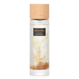 Botanica Sleep Ocean reed diffuser in a clear bottle with wooden lid, featuring soothing floral and citrus scents for relaxation.