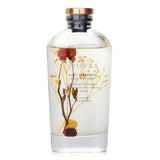 Rose-scented reed diffuser in a clear bottle, elegantly packaged, creates a calming home ambiance for 1.5 months.