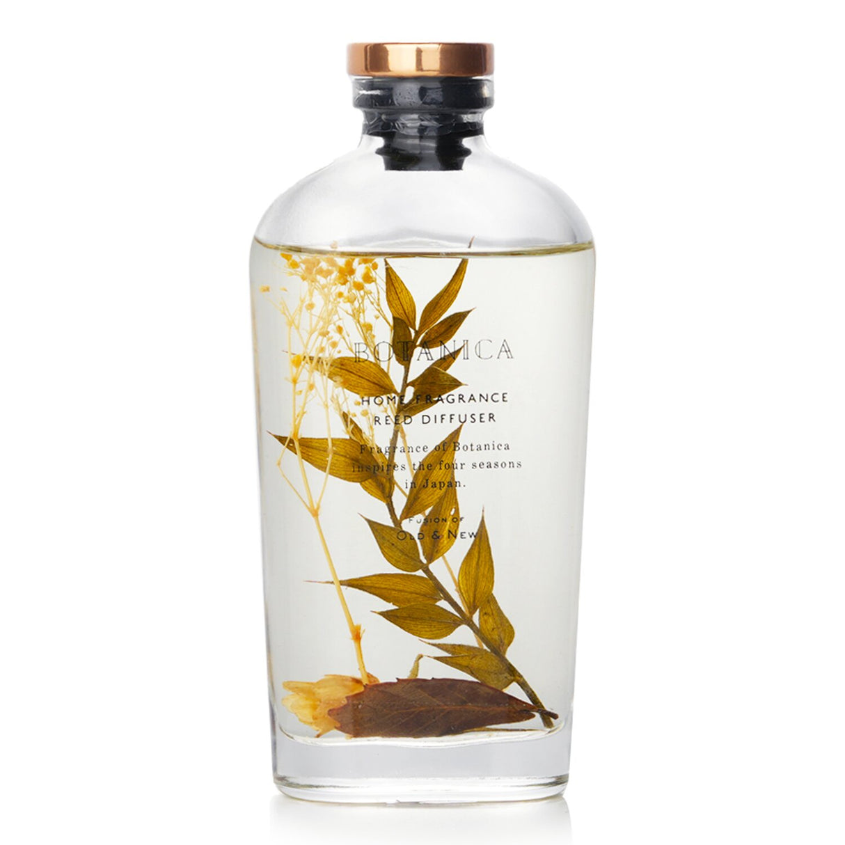Herbal reed diffuser in a transparent bottle, featuring botanicals, perfect for creating a calming home atmosphere.