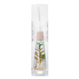 Elegant green herbal reed diffuser in pyramid-shaped bottle, provides fresh, soothing fragrance for tranquil home ambiance.
