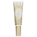 Luxurious Voluspa Suede Blanc Hand Cream with notes of Buttery Sueded Leather, Amber, and Cedar for soft, hydrated hands.