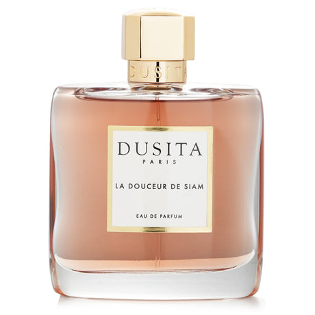 Dusita La Douceur De Siam Eau De Parfum in a 100ml spray, featuring an enchanting amber floral scent evoking a Thai spice garden.