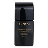 Sheer foundation in Ivory Beige with SPF15, delivering a dewy finish and light-enhancing properties for radiant skin.