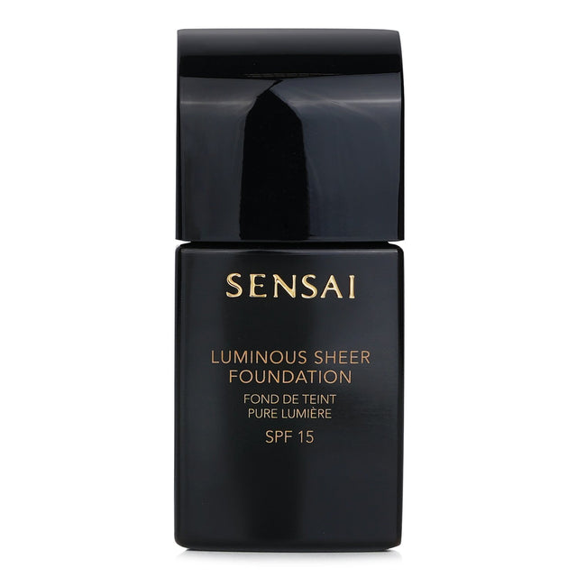 Sheer foundation in Ivory Beige with SPF15, delivering a dewy finish and light-enhancing properties for radiant skin.