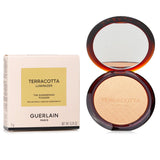 Guerlain Terracotta Luminizer #01 Warm Gold, a 7g shimmering powder for a radiant, sun-kissed glow with Argan oil nourishment.