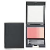 SUQQU Pure Color Blush #10 Usumoya in elegant packaging, offering a lightweight, radiant finish for a youthful glow.