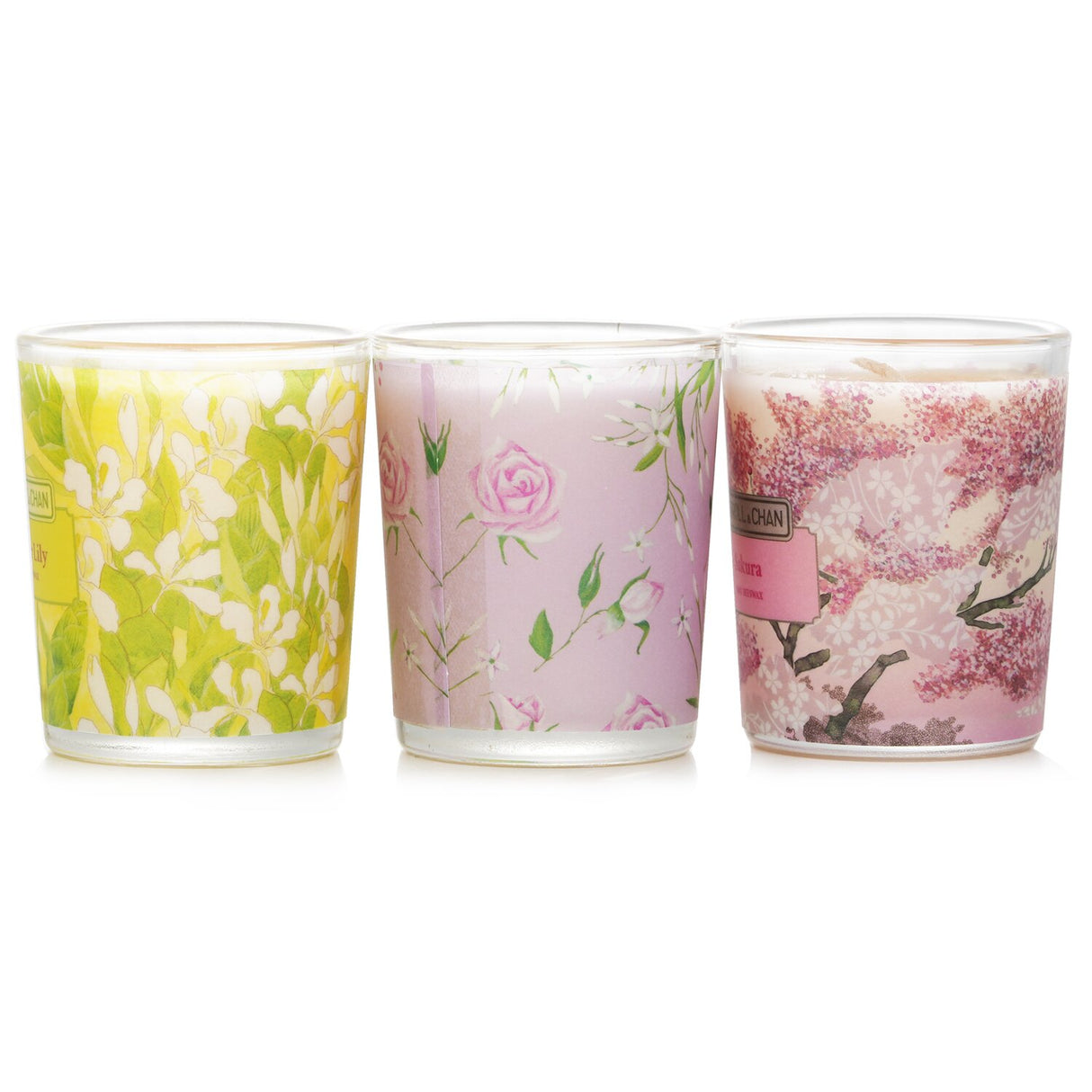 Elegant votive candle set featuring Sakura, Jasmine, Rose & Cranberry, and Ginger Lily scents in recycled glass jars.