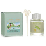 Mini diffuser labeled "Green Seas," featuring sea salt, sage, and white cedar scents in a stylish eco-friendly box.