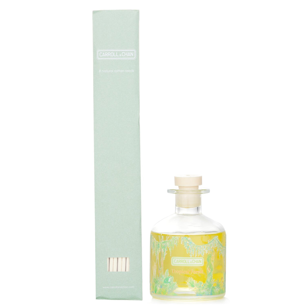 Reed diffuser refill set featuring tropical forest scents of sea moss, coastal redwoods, and vetiver in an elegant eco-friendly bottle.