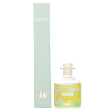 Reed diffuser refill set featuring tropical forest scents of sea moss, coastal redwoods, and vetiver in an elegant eco-friendly bottle.