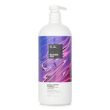 Purple toning shampoo for blondes, neutralizing brassiness while enhancing shine and moisture with botanical extracts.