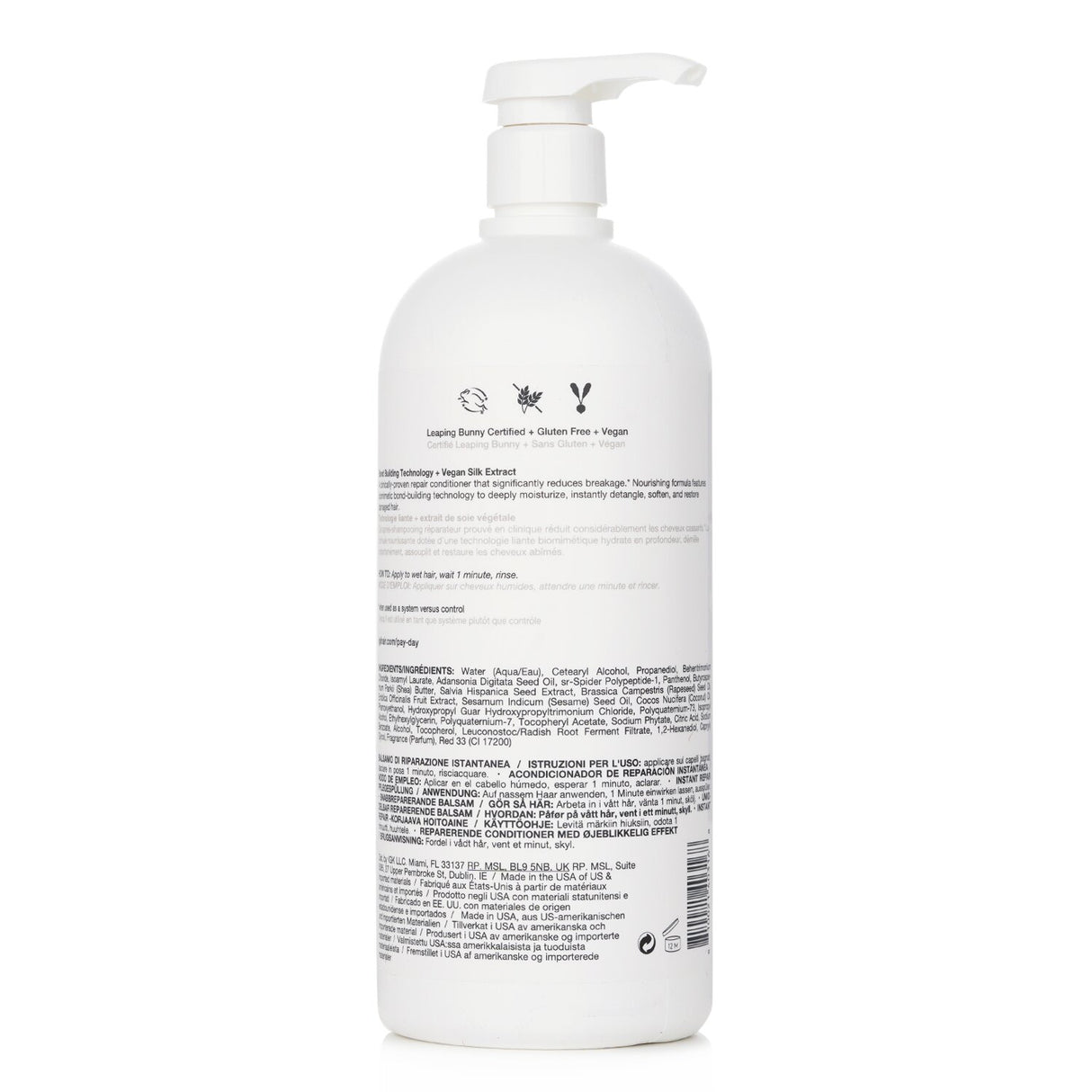 Revitalizing 1000ml conditioner for damaged hair with vegan silk, baobab oil, and amla oil for deep hydration and repair.