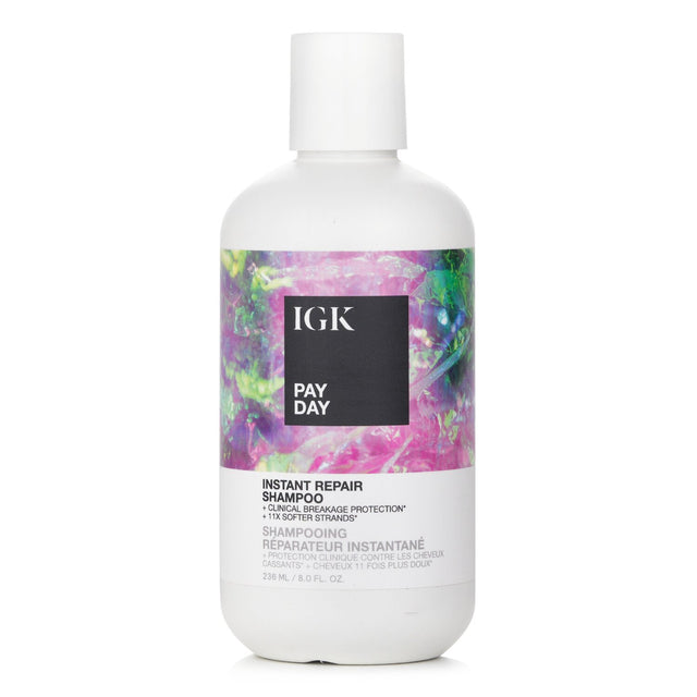 Bottle of IGK Pay Day Instant Repair Shampoo, a restorative formula for damaged hair with baobab and amla oils, 236ml size.