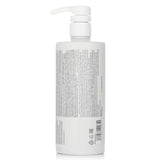 Moisturizing treatment for dry, frizzy, and color-treated hair, ensuring hydration and shine in a 500ml bottle.