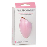 Real Techniques Miracle Powder Sponge for seamless blending and setting, crafted with latex-free foam for a soft-focus finish.