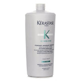 Kerastase Symbiose Conditioner: 1000ml soothing formula for dandruff-prone scalps, enriched with salicylic acid and Bifidus.