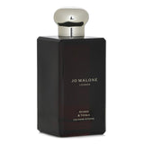 Jo Malone Myrrh & Tonka Cologne Intense Spray, a luxurious fragrance with rich myrrh and creamy tonka, 100ml, eco-friendly packaging.